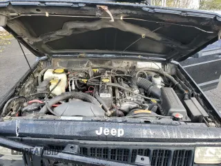 1996 Jeep Cherokee Sport with VIN 1J4FJ68S4TL240696, listed as a Copart auction lot 81193184 with 125,682 mi miles and Salvage Title. Bid and sale history available at carsss.com. Image 12.