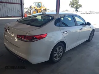 2016 Kia Optima LX with VIN KNAGT4L34G5105864, listed as a IAAI auction lot 42161194 with 106,351 mi miles. Bid and sale history available at carsss.com. Image 4.