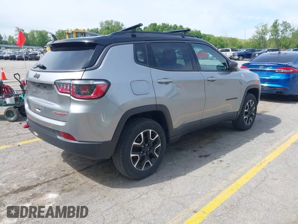 2020 Jeep Compass Trailhawk z VIN 3C4NJDDB0LT221532, wystawiony jako IAAI lot #42310215 z przebiegiem 78 464 mil mil oraz . Historia ofert i sprzedaży dostępna na DreamBid. Obrazek 4.