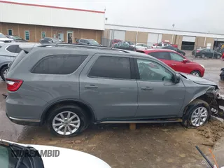 2023 Dodge Durango SXT z VIN 1C4RDHAG9PC569511, wystawiony jako IAAI lot #41952170 z przebiegiem 55 653 mil mil oraz . Historia ofert i sprzedaży dostępna na DreamBid. Obrazek 13.