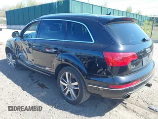 2014 Audi Q7 Premium Plus with VIN WA1LGAFE5ED014701, listed as a IAAI auction lot 42107552 with 98,919 mi miles and . Bid and sale history available at DreamBid. Image 3.