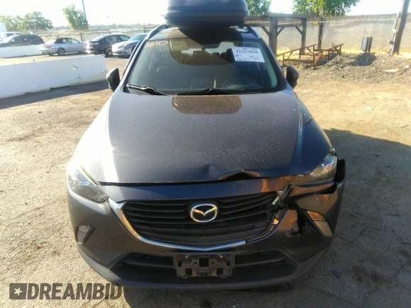 2017 Mazda CX-3 Touring z VIN JM1DKFC72H0142319, wystawiony jako IAAI lot #42223888 z przebiegiem 128 592 mil mil oraz . Historia ofert i sprzedaży dostępna na DreamBid. Obrazek 12.