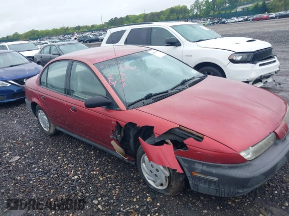 1997 Saturn SL with VIN 1G8ZF5289VZ138039, listed as a IAAI auction lot 39432871 with 125,022 mi miles. Bid and sale history available at carsss.com. Image 1.