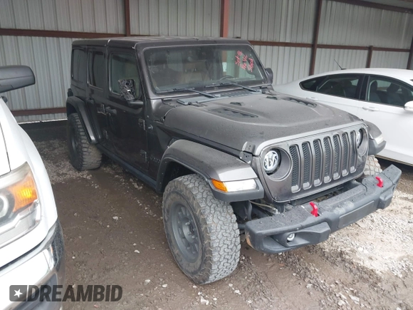 2021 Jeep Wrangler Unlimited Rubicon with VIN 1C4JJXFM6MW538774, listed as a IAAI auction lot 42368651 with 49,490 mi miles and . Bid and sale history available at DreamBid. Image 6.