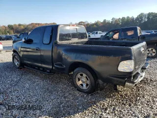 1999 Ford F-150 XL with VIN 2FTRX07W0XCA08082, listed as a Copart auction lot 82246214 with 189,950 mi miles and Salvage title. Bid and sale history available at DreamBid. Image 2.