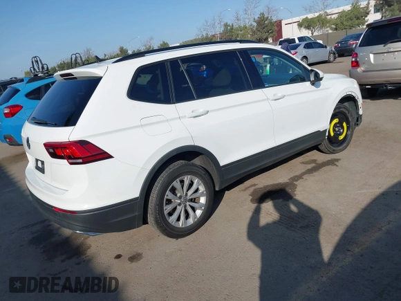 2020 Volkswagen Tiguan S z VIN 3VV1B7AX4LM098567, wystawiony jako IAAI lot #41504191 z przebiegiem 106 012 mil mil oraz . Historia ofert i sprzedaży dostępna na DreamBid. Obrazek 4.