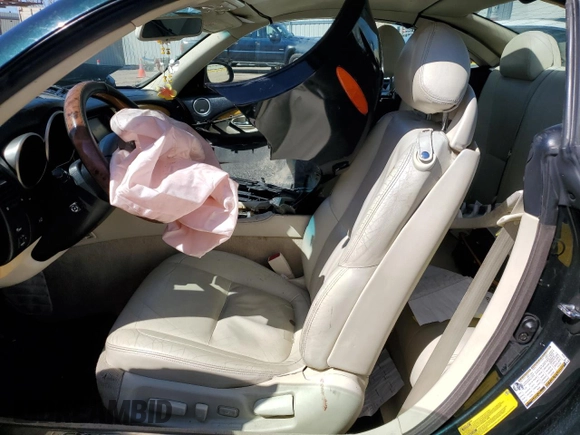 2005 Lexus SC 430 z VIN JTHFN48Y550070001, wystawiony jako Copart lot #49179564 z przebiegiem Nie podano mil oraz Szkoda całkowita • Salvage title. Historia ofert i sprzedaży dostępna na DreamBid. Obrazek 7.