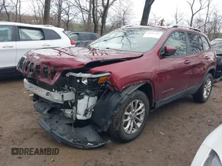 2020 Jeep Cherokee Latitude with VIN 1C4PJMCB3LD650308, listed as a IAAI auction lot 41052567 with 114,049 mi miles. Bid and sale history available at carsss.com. Image 6.