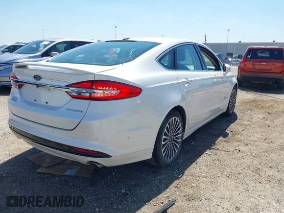 2017 Ford Fusion Titanium with VIN 3FA6P0SUXHR147336, listed as a IAAI auction lot 41873106 with 103,247 mi miles and . Bid and sale history available at DreamBid. Image 4.