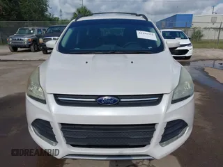 2014 Ford Escape SE with VIN 1FMCU0GX2EUA02753, listed as a IAAI auction lot 42191334 with 205,289 mi miles. Bid and sale history available at carsss.com. Image 6.