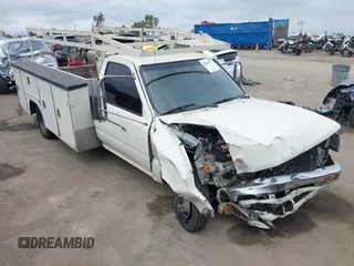 1990 Toyota Pickup z VIN JT5VN94T1L0016515, wystawiony jako IAAI lot #42405471 z przebiegiem 421 487 mil mil oraz . Historia ofert i sprzedaży dostępna na DreamBid. Obrazek 1.