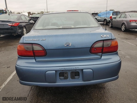 1999 Chevrolet Malibu LS with VIN 1G1NE52M9XY139570, listed as a Copart auction lot 80930334 with 121,273 mi miles and Salvage Title. Bid and sale history available at carsss.com. Image 6.
