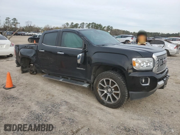 2019 GMC Canyon 4WD Denali with VIN 1GTG6EEN6K1111583, listed as a Copart auction lot 88544395 with 75,454 mi miles and Salvage Title. Bid and sale history available at carsss.com. Image 4.
