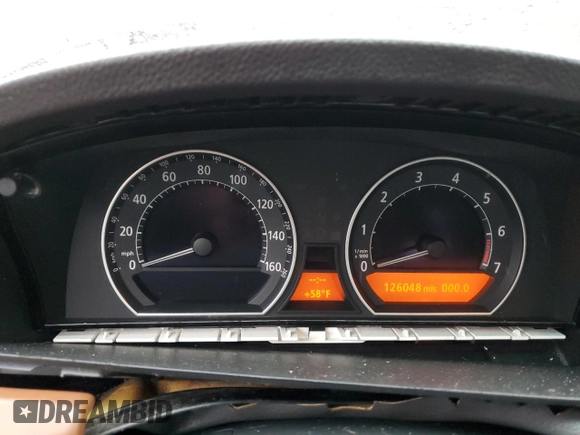 2004 BMW 7 Series 745i with VIN WBAGL63424DP68405, listed as a Copart auction lot 51768045 with 126,048 mi miles and Salvage Title. Bid and sale history available at DreamBid. Image 9.