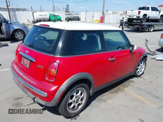 2004 MINI Hardtop with VIN WMWRC33484TC55840, listed as a IAAI auction lot 42088687 with 135,353 mi miles and . Bid and sale history available at DreamBid. Image 4.