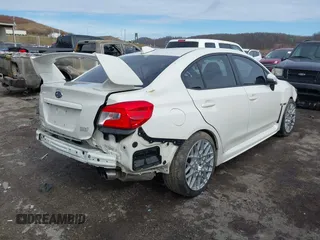 2016 Subaru WRX STI with VIN JF1VA2V63G9818135, listed as a IAAI auction lot 41465148 with 52,000 mi miles and . Bid and sale history available at DreamBid. Image 4.