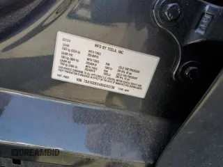 2024 Tesla Model Y Long Range с VIN 7SAYGDEE4RA243738, выставлен на аукционе Copart как лот 48953885 с пробегом Не указан миль и Списание • Salvage title. История ставок и продаж доступна на DreamBid. Изображение 13.