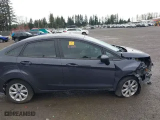 2012 Ford Fiesta SE with VIN 3FADP4BJXCM216102, listed as a IAAI auction lot 41903721 with 125,760 mi miles. Bid and sale history available at carsss.com. Image 13.