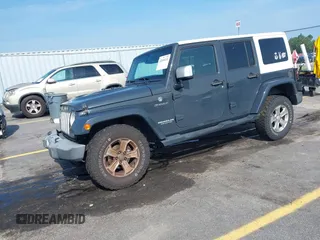 2017 Jeep Wrangler Unlimited Sahara with VIN 1C4HJWEG3HL648158, listed as a IAAI auction lot 42416132 with 95,954 mi miles and . Bid and sale history available at DreamBid. Image 2.