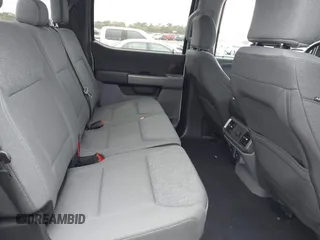 2024 Ford F-150 Lightning XLT with VIN 1FTVW3LKXRWG01185, listed as a IAAI auction lot 41679606 with 4,961 mi miles and . Bid and sale history available at DreamBid. Image 8.