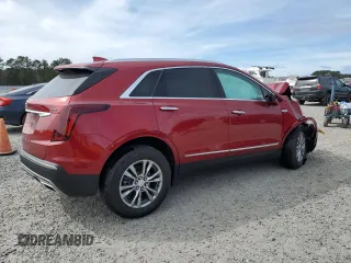 2022 Cadillac XT5 FWD Premium Luxury z VIN 1GYKNCRS9NZ130520, wystawiony jako Copart lot #47178275 z przebiegiem 8 564 mil mil oraz Szkoda całkowita • Salvage title. Historia ofert i sprzedaży dostępna na DreamBid. Obrazek 3.