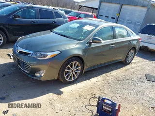 2014 Toyota Avalon Limited z VIN 4T1BK1EB0EU118032, wystawiony jako IAAI lot #41864586 z przebiegiem 72 477 mil mil oraz . Historia ofert i sprzedaży dostępna na DreamBid. Obrazek 18.