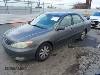 2004 Toyota Camry LE with VIN 4T1BF32K84U588764, listed as a IAAI auction lot 42126345 with 144,642 mi miles. Bid and sale history available at carsss.com. Image 18.