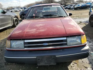 1988 Ford Tempo z VIN 1FAPP36X3JK242180, wystawiony jako Copart lot #43068915 z przebiegiem 508 437 mil mil oraz Tytuł czysty. Historia ofert i sprzedaży dostępna na DreamBid. Obrazek 5.