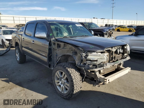 2015 Toyota Tacoma z VIN 3TMLU4EN3FM165978, wystawiony jako Copart lot #49920255 z przebiegiem 134 974 mil mil oraz Szkoda całkowita • Salvage title. Historia ofert i sprzedaży dostępna na DreamBid. Obrazek 4.