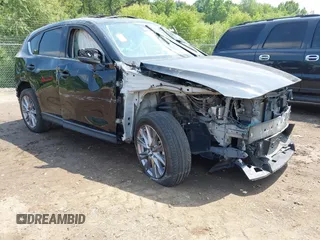 2020 Mazda CX-5 Grand Touring with VIN JM3KFADM2L0731972, listed as a IAAI auction lot 42686202 with Not provided miles and . Bid and sale history available at DreamBid. Image 1.