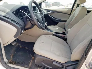 2015 Ford Focus SE z VIN 1FADP3F22FL343834, wystawiony jako Copart lot #58076265 z przebiegiem 101 891 mil mil oraz Szkoda całkowita • Salvage title. Historia ofert i sprzedaży dostępna na DreamBid. Obrazek 7.