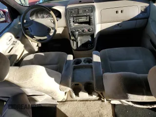 2005 Kia Sedona LX with VIN KNDUP132156669009, listed as a Copart auction lot 76936094 with 124,989 mi miles and Salvage Title. Bid and sale history available at carsss.com. Image 8.