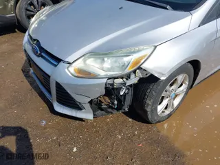 2012 Ford Focus SE with VIN 1FAHP3F2XCL152921, listed as a IAAI auction lot 41962319 with 149,910 mi miles. Bid and sale history available at carsss.com. Image 6.