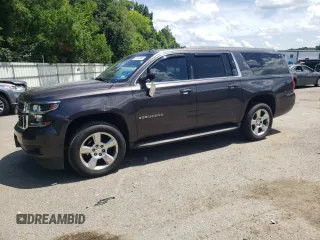 2015 Chevrolet Suburban LT with VIN 1GNSCJKC5FR254778, listed as a Copart auction lot 62424055 with 179,219 mi miles and Salvage title. Bid and sale history available at DreamBid. Image 1.