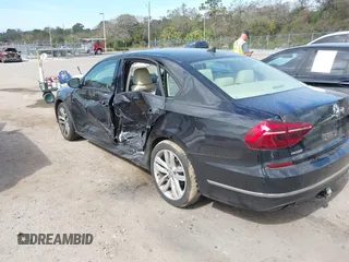 2019 Volkswagen Passat 2.0T Wolfsburg Edition with VIN 1VWLA7A34KC012694, listed as a IAAI auction lot 41579392 with 80,846 mi miles. Bid and sale history available at carsss.com. Image 3.