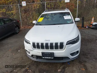 2019 Jeep Cherokee Altitude with VIN 1C4PJMLN1KD412708, listed as a IAAI auction lot 40846567 with 77,314 mi miles and . Bid and sale history available at DreamBid. Image 13.