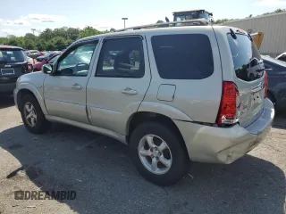 2005 Mazda Tribute i with VIN 4F2YZ92Z55KM53695, listed as a Copart auction lot 61494224 with 144,911 mi miles and Salvage Title. Bid and sale history available at carsss.com. Image 2.