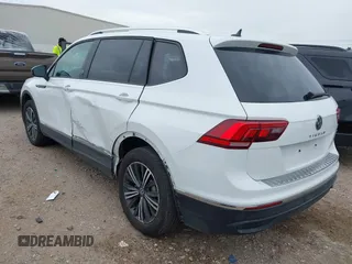 2024 Volkswagen Tiguan Wolfsburg Edition with VIN 3VV5B7AXXRM233917, listed as a IAAI auction lot 42780573 with 11,983 mi miles and . Bid and sale history available at DreamBid. Image 3.