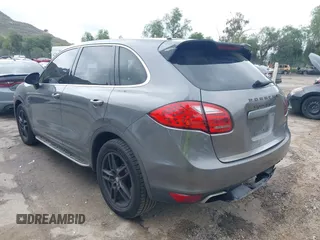 2012 Porsche Cayenne S Hybrid with VIN WP1AE2A25CLA90636, listed as a IAAI auction lot 41922089 with 90,318 mi miles and . Bid and sale history available at DreamBid. Image 3.