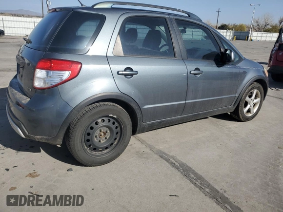 2009 Suzuki SX4 AWD z VIN JS2YB413895101919, wystawiony jako Copart lot #52235635 z przebiegiem 193 065 mil mil oraz Czysty tytuł • Clean title. Historia ofert i sprzedaży dostępna na DreamBid. Obrazek 3.