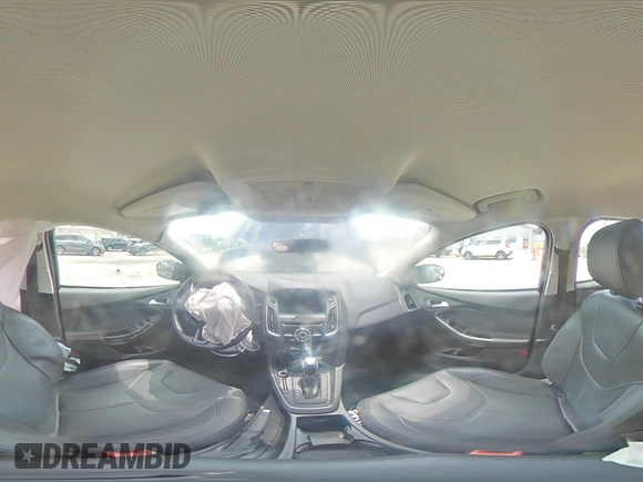 2016 Ford Focus SE z VIN 1FADP3F23GL288232, wystawiony jako Copart lot #62565095 z przebiegiem 11 634 mil mil oraz Szkoda całkowita • Salvage title. Historia ofert i sprzedaży dostępna na DreamBid. Obrazek 14.
