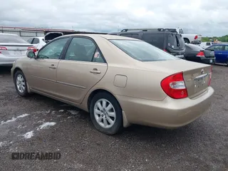 2002 Toyota Camry LE z VIN 4T1BE32K52U086150, wystawiony jako IAAI lot #42126685 z przebiegiem 175 212 mil mil oraz . Historia ofert i sprzedaży dostępna na DreamBid. Obrazek 3.