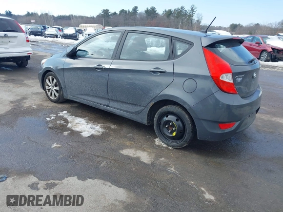 2012 Hyundai Accent SE with VIN KMHCU5AE4CU037411, listed as a IAAI auction lot 41659662 with 163,021 mi miles. Bid and sale history available at carsss.com. Image 3.