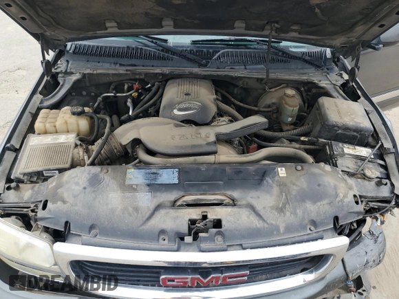 2002 GMC Yukon SLE z VIN 1GKEC13V52J192656, wystawiony jako Copart lot #46674605 z przebiegiem 258 336 mil mil oraz Szkoda całkowita • Salvage title. Historia ofert i sprzedaży dostępna na DreamBid. Obrazek 13.