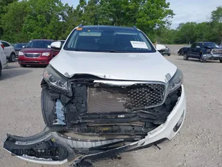 2017 Kia Sorento SXL z VIN 5XYPK4A58HG251610, wystawiony jako IAAI lot #42351313 z przebiegiem 147 527 mil mil oraz . Historia ofert i sprzedaży dostępna na DreamBid. Obrazek 12.