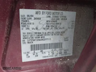 2004 Ford F-150 XLT with VIN 1FTPW12564KD77115, listed as a IAAI auction lot 41929386 with 213,172 mi miles. Bid and sale history available at carsss.com. Image 9.