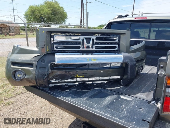 2007 Honda Ridgeline RTL with VIN 2HJYK16577H537990, listed as a IAAI auction lot 42454619 with 182,911 mi miles and . Bid and sale history available at DreamBid. Image 12.