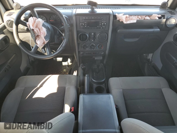 2009 Jeep Wrangler Unlimited X with VIN 1J4GA39179L756228, listed as a Copart auction lot 50086445 with 158,274 mi miles and Salvage Title. Bid and sale history available at carsss.com. Image 8.
