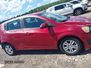 2012 Chevrolet Sonic LT with VIN 1G1JC6SH6C4168488, listed as a IAAI auction lot 42308645 with 136,720 mi miles and . Bid and sale history available at DreamBid. Image 14.
