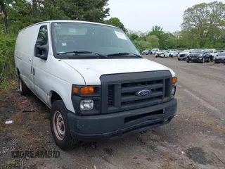 2010 Ford Econoline Cargo Commercial z VIN 1FTNE1EW8ADA91295, wystawiony jako IAAI lot #42299812 z przebiegiem 152 832 mil mil oraz . Historia ofert i sprzedaży dostępna na DreamBid. Obrazek 1.